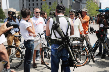 Guns at the convention group carrying guns