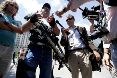Guns at the convention Steve Thacker carries an AR-15