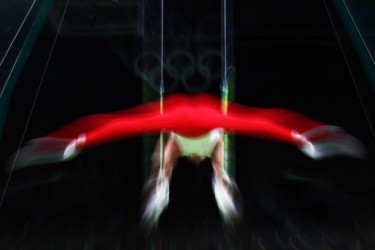 Olympians in motion: Gymnastics gymnist on rings