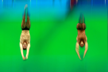 Olympians in motion: Diving two men diving into pool
