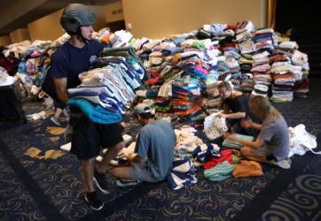Texans seek rescue and refuge from Harvey
