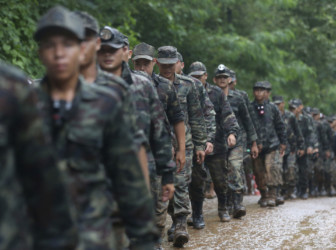 Thailand Cave Search Thai soldiers march to cave