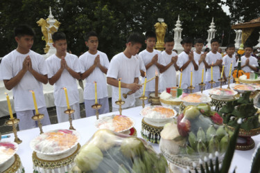 Ekkapol Chantawong Thai soccer team attend a Buddhist ceremony
