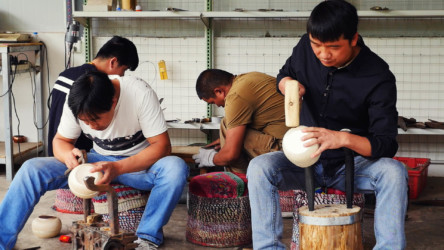 Road to Riches Artisans working in their studio.