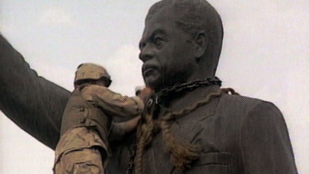 Iraq: War Continued Soldier removing statue