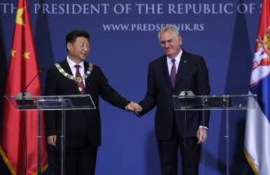 President Xi Jinping holds a press conference with Serbian President Tomislav Nikolic in Belgrade, Serbia hina's President Xi Jinping (L) and his Serbian counterpart Tomislav Nikolic shake hands after delivering a joint press conference