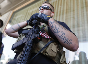 Guns on the street man carrying ar-15