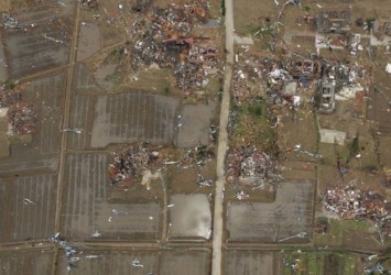 Tornado and extreme storms destroyed houses in Funing, China Residents walk in the rubble of destroyed houses after a tornado in Funing, in Yancheng, in China