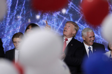 The big finale Donald Trump looks up at the falling balloons