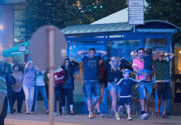 People evacuating the Olympia mall People evacuating the Olympia mall