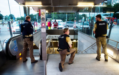 Police on the grounds Police secures the entrance to a subway
