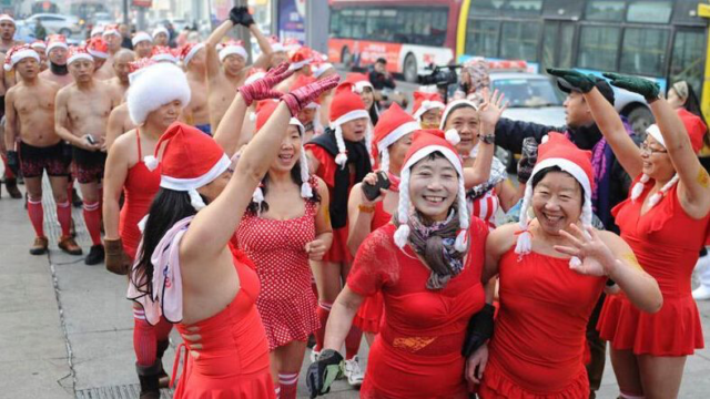 Santa swimsuit run raises money for rural children in Changchun