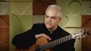 Classical guitarist Ricardo Cobo inspired by Magical Realism