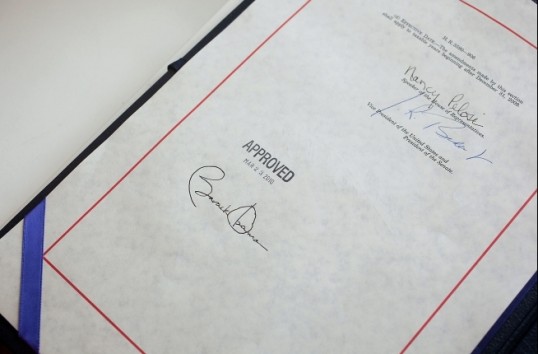 President Obama's signature on the health insurance reform bill