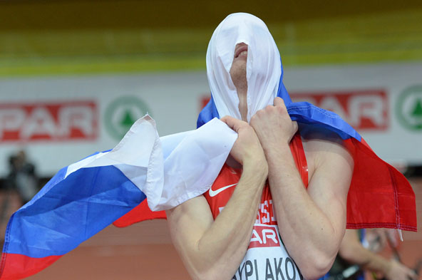 Russia's Daniyil Tsyplakov celebrates gold medal during men's high jump final event at the European Athletics Indoor Championships on March 8, 2015 in Prague. AFP /Joe Klamar