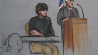 FILE - In this Jan. 5, 2015, file courtroom sketch, Boston Marathon bombing suspect Dzhokhar Tsarnaev, left, is depicted beside U.S. District Judge George O'Toole Jr., right, as O'Toole addresses a pool of potential jurors in a jury assembly room at the federal courthouse, in Boston. (AP Photo/Jane Flavell Collins, File)