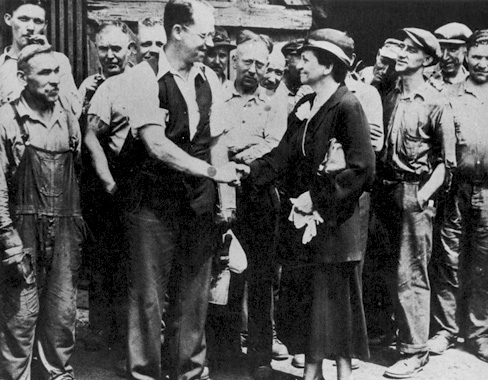 (R) Frances Perkins meets with Carnegie Steel Workers (1933) [Photo: FDR Library]