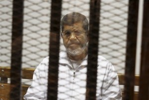 On Tuesday April 21, 2015, an Egyptian criminal court sentenced Morsi to 20 years in prison over the killing of protesters in 2012, the first verdict to be issued against the leader. The case stems from violence outside the presidential palace in December 2012. (AP Photo/Tarek el-Gabbas, File)