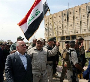raqi Prime Minister Haider al-Abadi tours the city of Tikrit after it was retaken by the security forces in Baghdad, Iraq, Wednesday, April 1, 2015. Iraq declared a "magnificent victory" over the Islamic State group in Tikrit, a key step in driving the militants out of their biggest strongholds. (AP Photo)