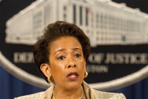 Attorney General Loretta Lynch announces a civil rights investigation of the Baltimore Police Department during a news conference at the Justice Department in Washington, Friday, May 8, 2015. Lynch announced the Justice Department will conduct a broad investigation into the Baltimore police force in search of law enforcement practices that are unconstitutional and violate civil rights. (AP Photo/Jacquelyn Martin)