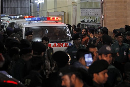 Ambulances carrying the bodies of Bangladeshi Nationalist Party leader Salahuddin Quader Chowdhury and Jamaat-e-Islami leader Ali Ahsan Mohammad Mujahid leave the Central Jail after they were executed in Dhaka, Bangladesh, Sunday, Nov. 22, 2015. Bangladesh executed the two influential opposition leaders on charges of war crimes during the country's 1971 independence war, a senior jail official said Sunday, despite concerns that the legal proceedings against them were flawed and threats of violence by their supporters. (AP Photo)