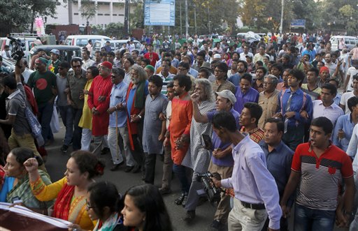 Bangladeshi activists who have been campaigning for capital punishment for war criminals march in a rally, as they celebrate the execution of two opposition leaders in Dhaka, Bangladesh, Sunday, Nov. 22, 2015. Bangladesh executed two opposition leaders Sunday for war crimes during the country's 1971 independence war, despite concerns that the legal proceedings against them were flawed and threats of violence by their supporters. (AP Photo)