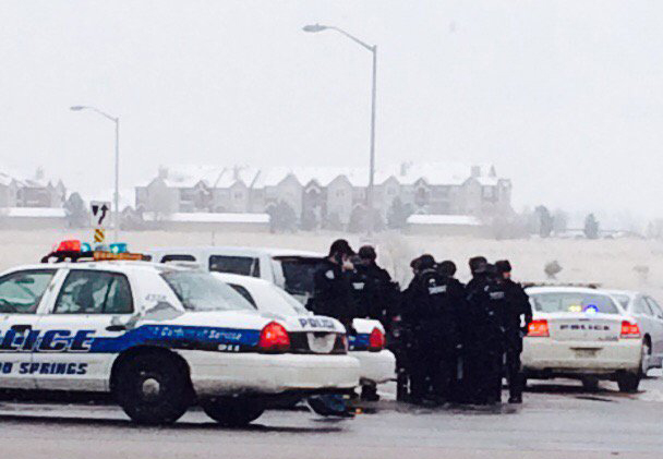 Authorities respond after reports of a shooting near a Planned Parenthood clinic Friday, Nov. 27, 2015, in Colorado Springs, Colo. Multiple officers were injured but it was not known if anyone else was wounded in the attack, authorities said. (Kody Fisher/FOX21 News via AP) 