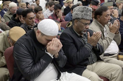 Muslim Community Prayer Vigil for San Bernadino shooting victims, in Chino, Calif., Thursday, Dec. 3, 2015. (AP Photo/Nick Ut)
