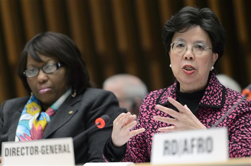 Carissa Etienne, left, Regional-Director for the WHO Pan American Health Organization, (WHO/PAHO) sits next to China's Margaret Chan, right, General Director of the World Health Organization, WHO, as she speaks about the Information Session on Zika virus for WHO Member States, during a WHO Executive Board session, at the World Health Organization (WHO) headquarters in Geneva, Switzerland, Thursday, Jan. 28, 2016. (Martial Trezzini/Keystone via AP)