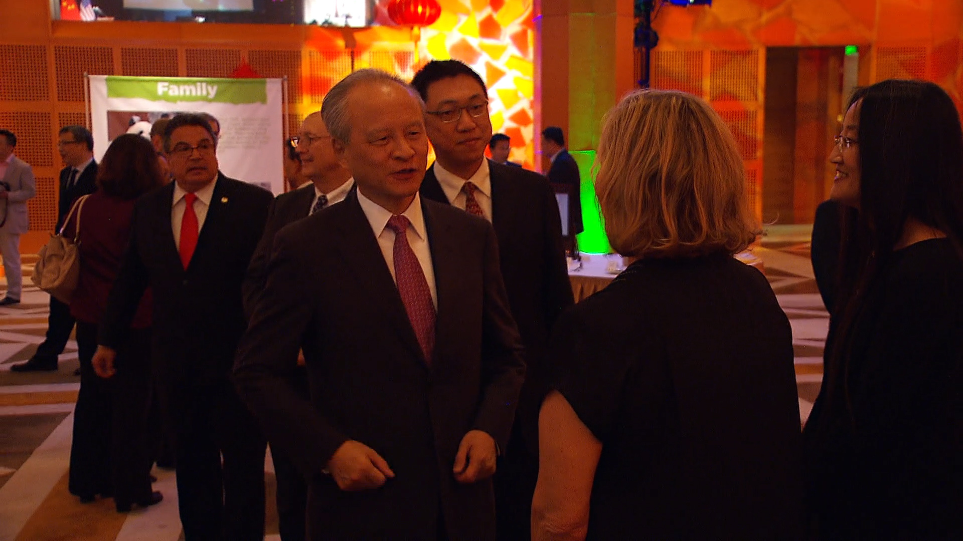 China's Ambassador to the United States Cui Tiankai speaks to Kung Fu Panda 3 Director Jennifer Yuh Nelson (far left) and another guest at the Embassy's screening of the film.