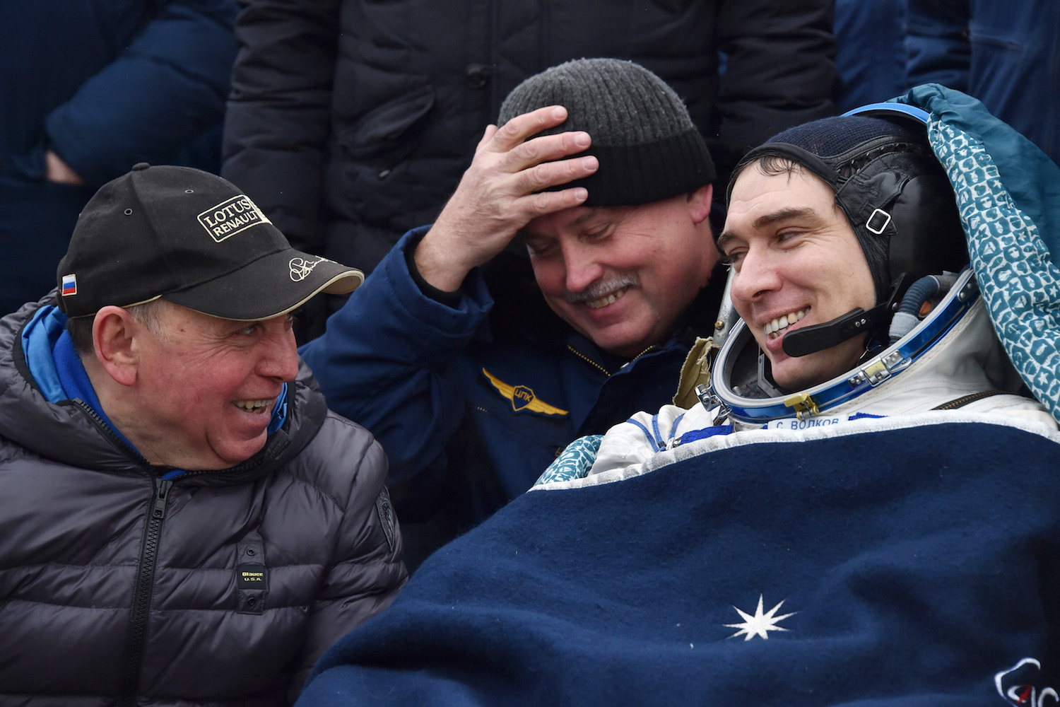 International Space Station (ISS) crew member Sergey Volkov of Russia looks at his father Soviet cosmonaut Alexander Volkov, left, after landing near the town of Dzhezkazgan, Kazakhstan, on Wednesday, March 2, 2016. US astronaut Scott Kelly and Russian cosmonaut Mikhail Kornienko returned to Earth on March 2 after spending almost a year in space in a ground-breaking experiment foreshadowing a potential manned mission to Mars. (Krill Kudryavtsev/Pool photo via AP)