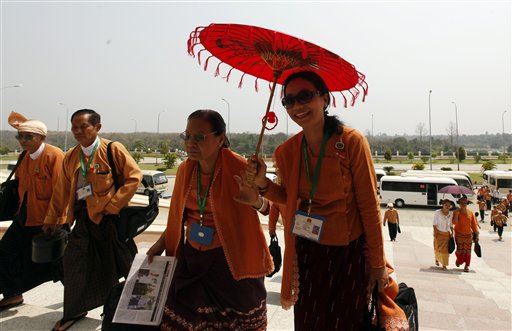 Lawmakers of the National League for Democracy party (NLD) arrive for a session at Myanmar parliament in Naypyitaw, Myanmar, Monday, March 14, 2016. Myanmar's parliament vote on Tuesday to pick the country's next president from a group of three final candidates, including a front runner who is a longtime confidant of Nobel laureate Suu Kyi. (AP Photo/Aung Shine Oo)