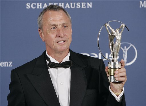 In this Monday May 22, 2006 file photo, Dutch soccer legend Johan Cruyff holds his lifetime achievement award during the Laureus World Sports Awards in Barcelona, Spain. Dutch soccer great Johan Cruyff has died in Barcelona on Thursday, March 24, 2016 at age 68. (AP Photo/Manu Fernandez, file)