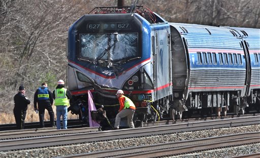 2 killed after Amtrak train hits backhoe, derails