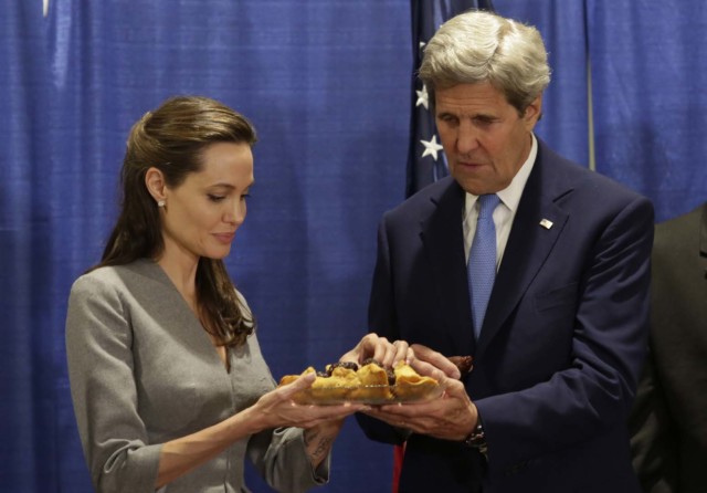 US Secretary of State John Kerry shares dates and samosa with actress Angelina Jolie, United Nations High Commissioner for Refugees (UNHCR) special envoy