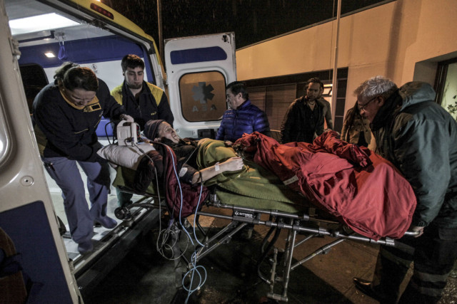 An injured worker arrives by ambulance at a clinic