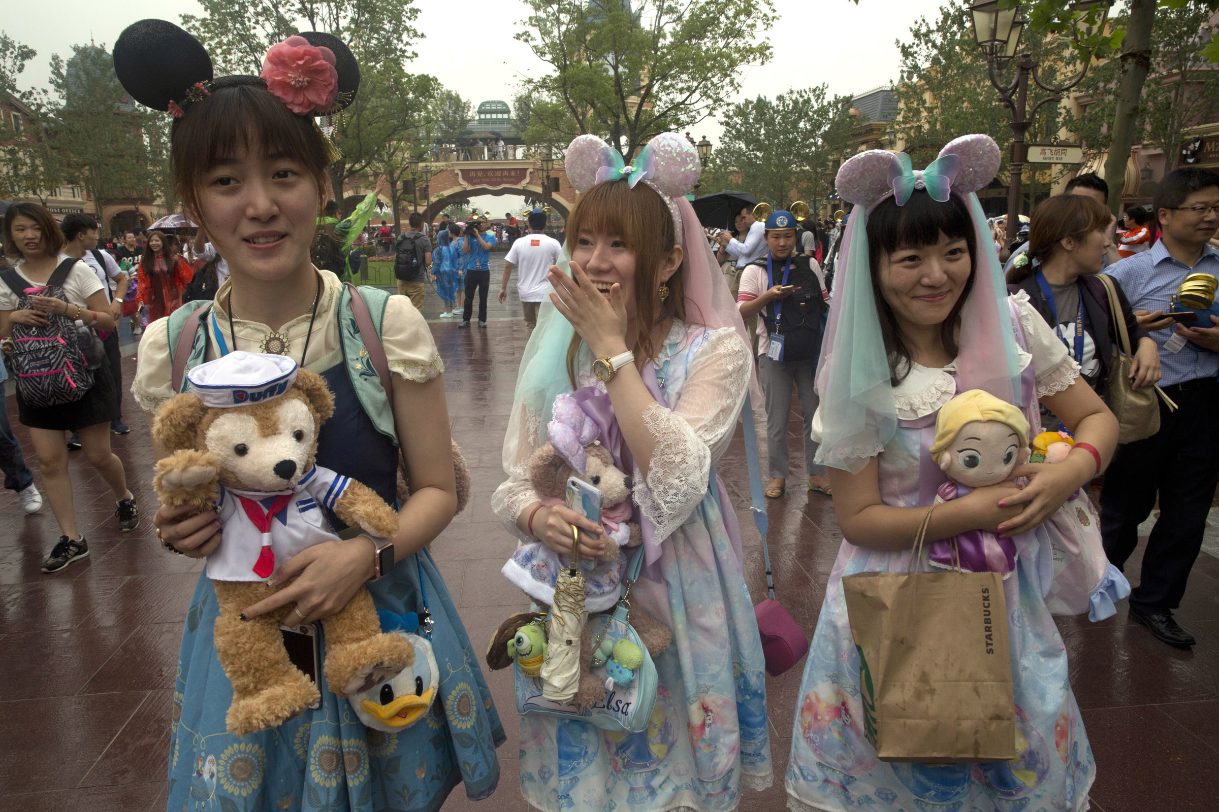 Visitors dress up as Disney characters