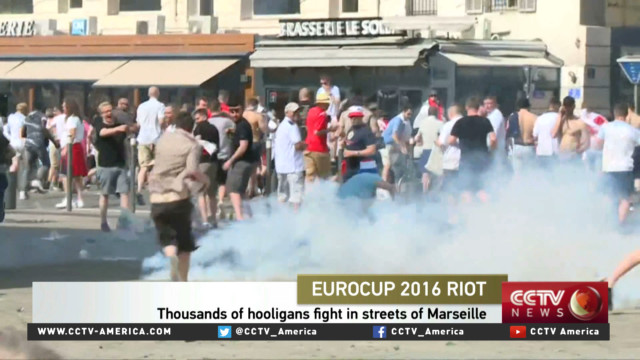 Soccer fans clash with riot police in Marseille