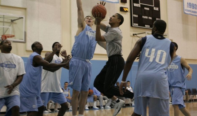 Obama playing basketball. (AP/Jae C. Hong)