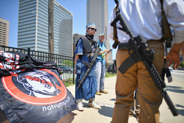 Demonstrators with guns