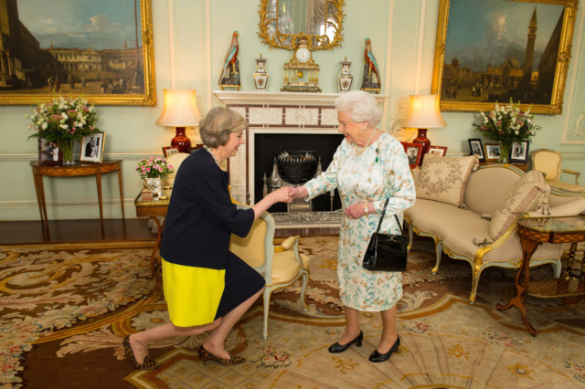 Queen Elizabeth II welcomes Theresa May