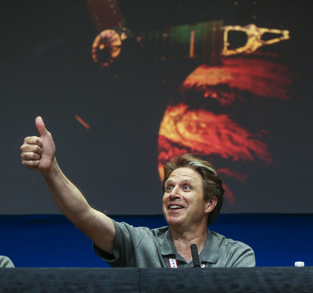 Scott Bolton speaks in a post-orbit insertion briefing at NASA's Jet Propulsion Laboratory following the solar-powered Juno spacecraft entered orbit around Jupiter on Monday, July 4, 2016, in Pasadena, Calif. (AP Photo/Ringo H.W. Chiu)