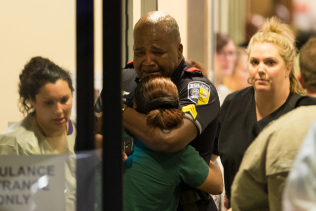 police officer receives comfort at the Baylor University Hospital