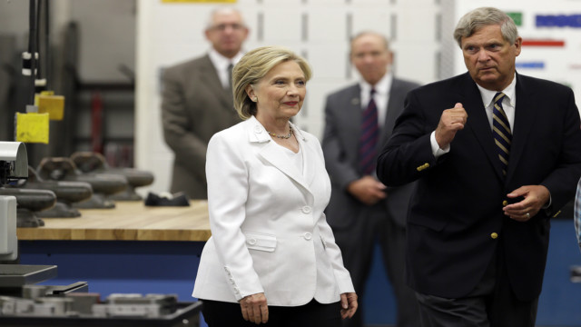 FILE - In this Aug. 26, 2015, file photo, Democratic presidential candidate Hillary Clinton and Agriculture Secretary Tom Vilsack tour the Tool and Die Lab at the Des Moines Area Community College in Ankeny, Iowa. Vilsack is possibly being considered as a potential running mate for Clinton. (AP Photo/Charlie Neibergall, File)