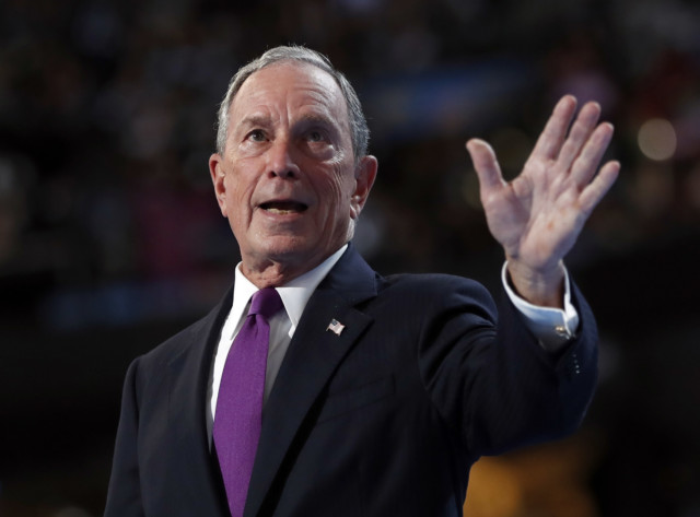 Michael Bloomberg waves
