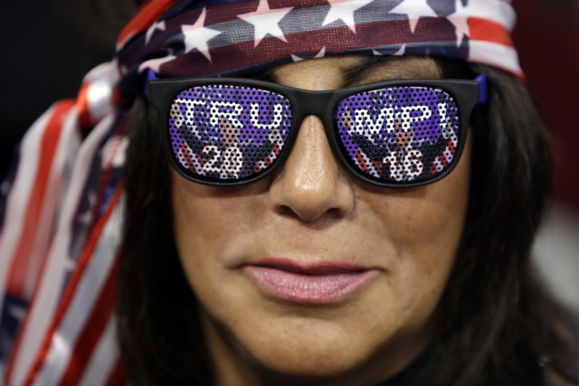 woman wears Trump sunglasses