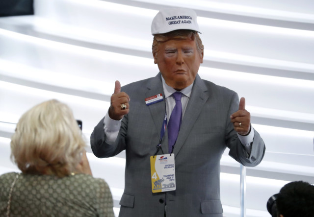 delegate wearing a Donald Trump mask