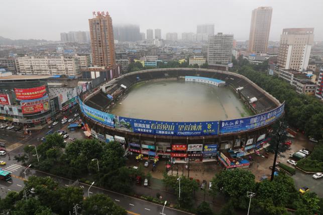 Floods in China kill hundreds, wipe out crops worth billions