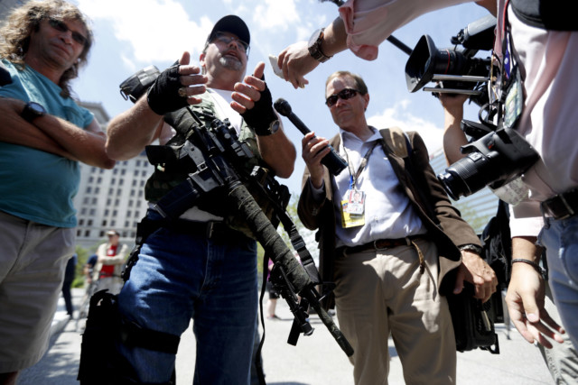 Steve Thacker carries an AR-15