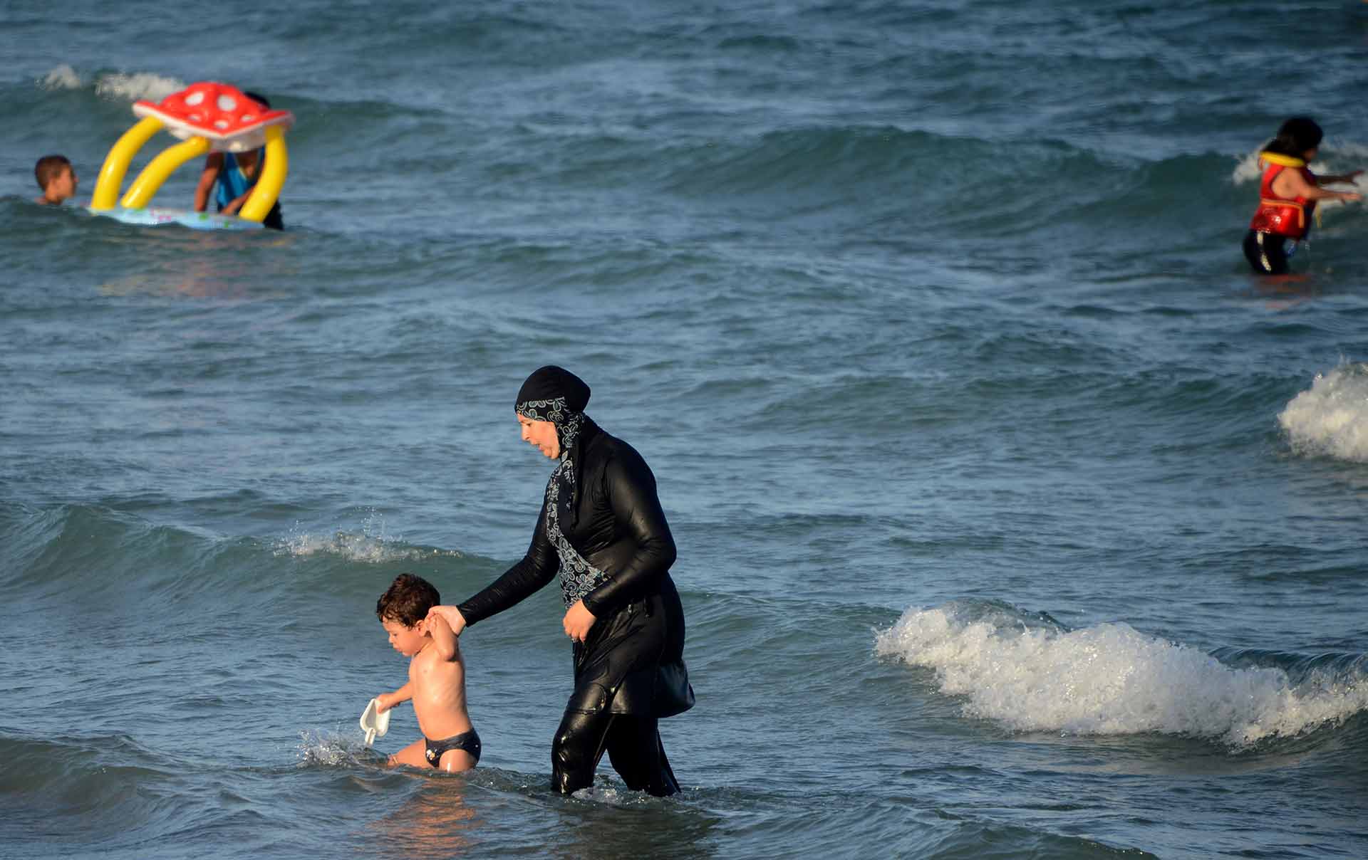Top French court rules Burkini bans violate basic freedoms